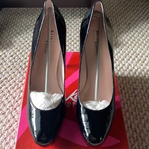 Black Patent heels, never used. With original box